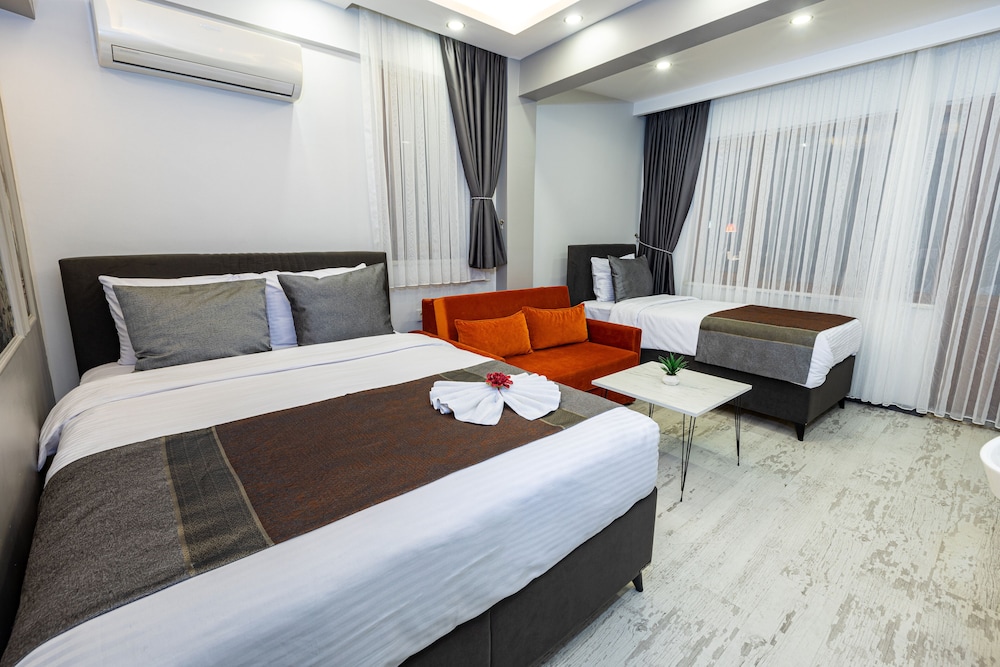 Design Quadruple Room, Garden View photo 2