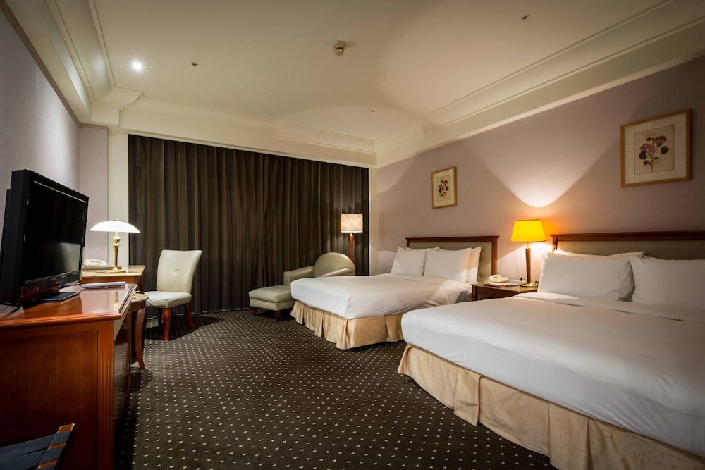 Deluxe Quadruple Room, City View