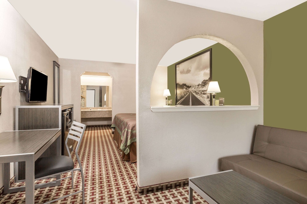 Suite, 1 King Bed, Smoking (Mini, First Floor) - Photo 1