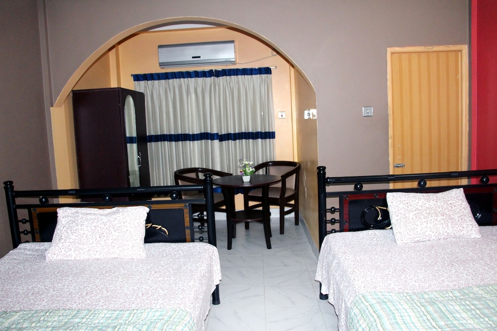 Deluxe Quadruple Room, Multiple Beds, Smoking, Garden View photo 1