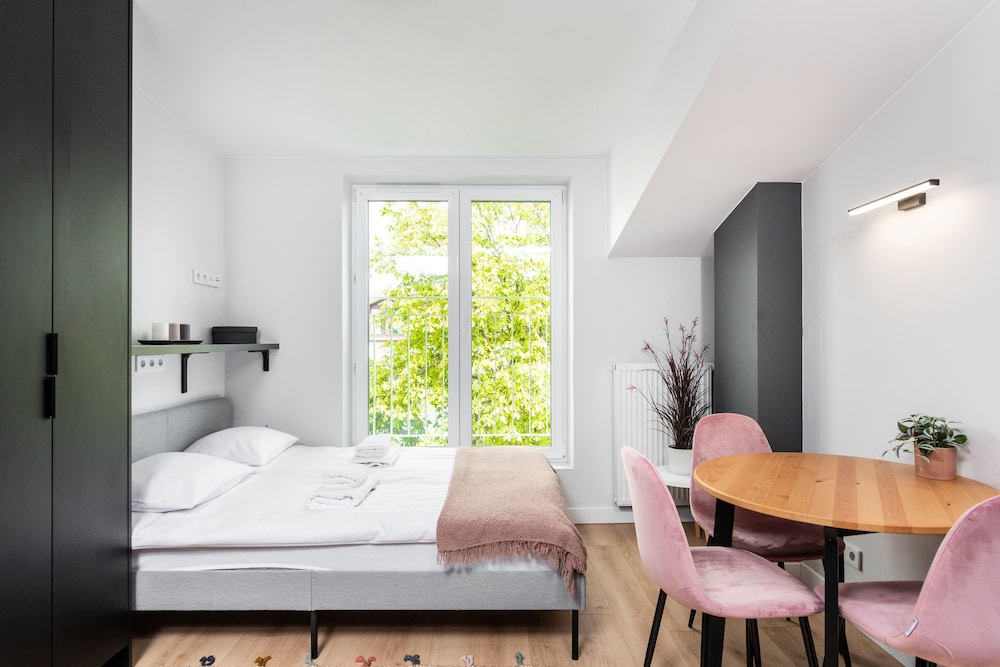 D. Studio Smart Apartments