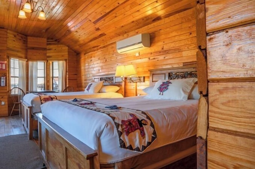 Quadruple Room (Log)