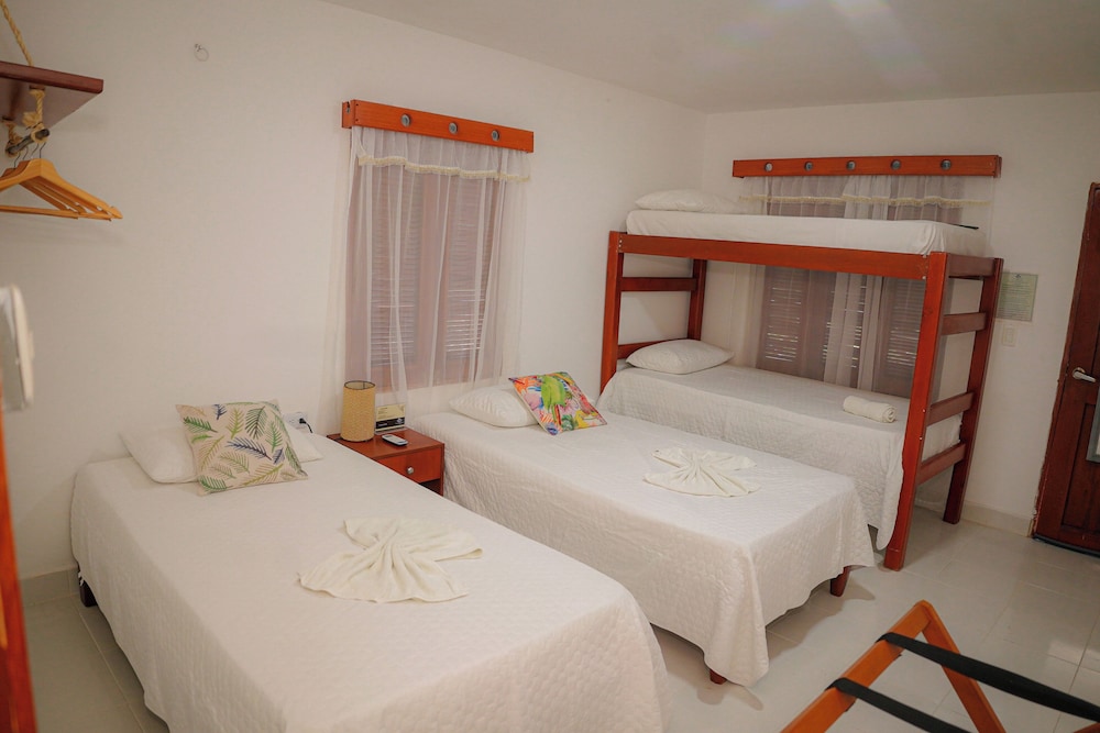 Family Triple Room, Multiple Beds, Private Bathroom, Garden Area photo 1