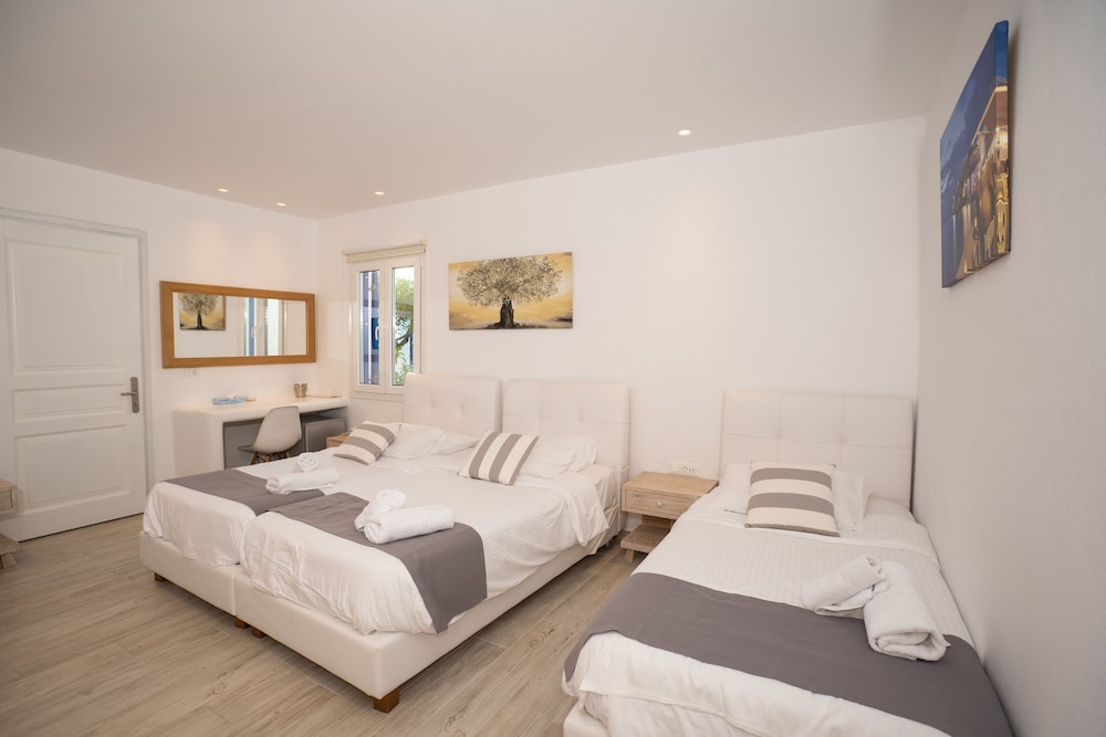 Deluxe Triple Room, Balcony, Garden View - Photo 1