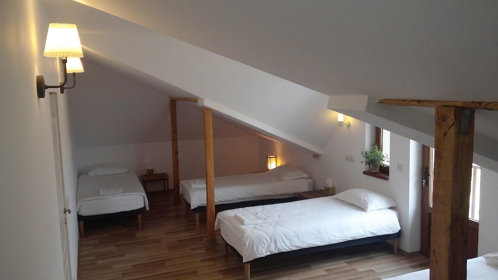 Family Quadruple Room, Multiple Beds, Private Bathroom, Courtyard View photo 1