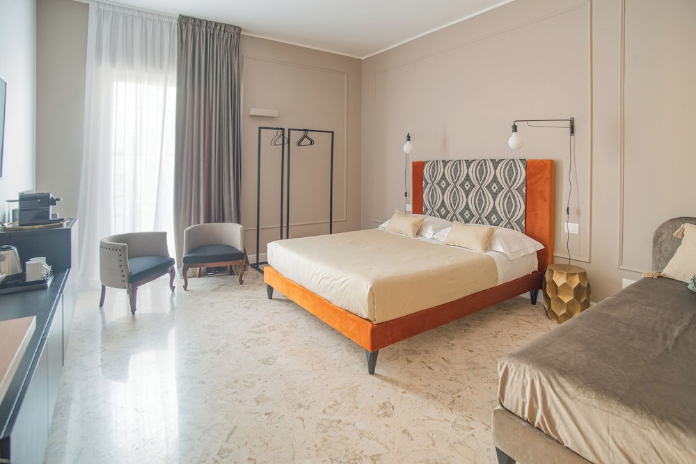 Deluxe Triple Room, Balcony, Courtyard View