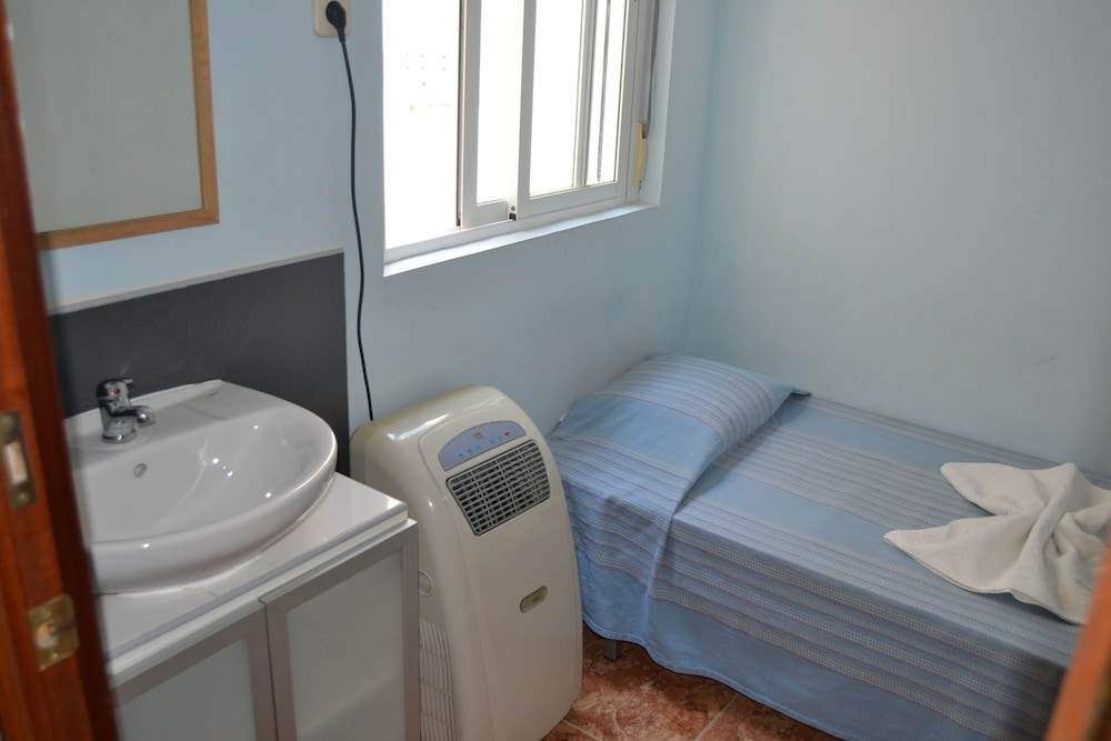 Habitación individual, baño compartido