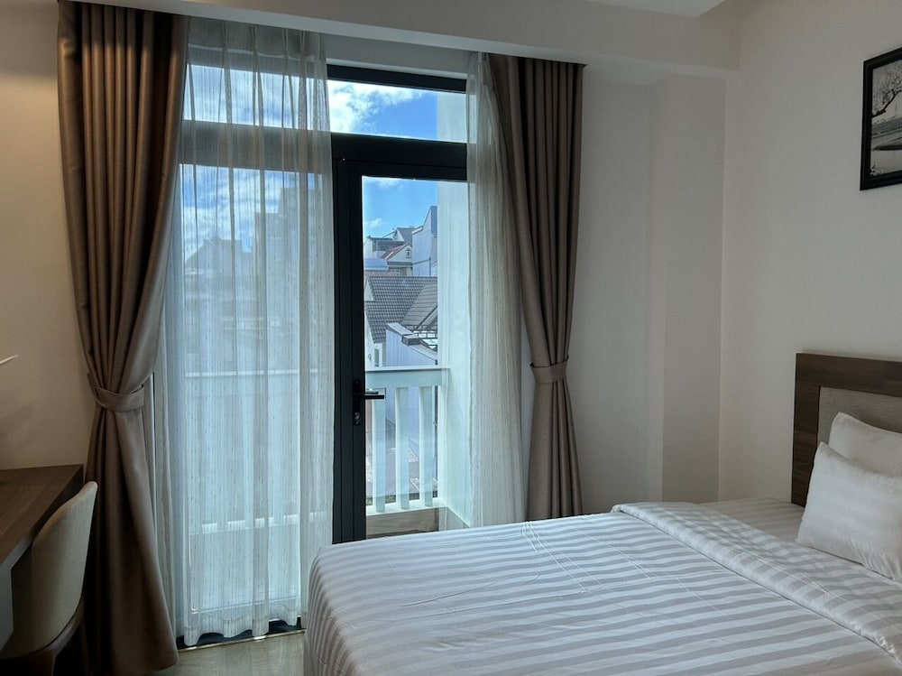 Deluxe Room - Photo 5
