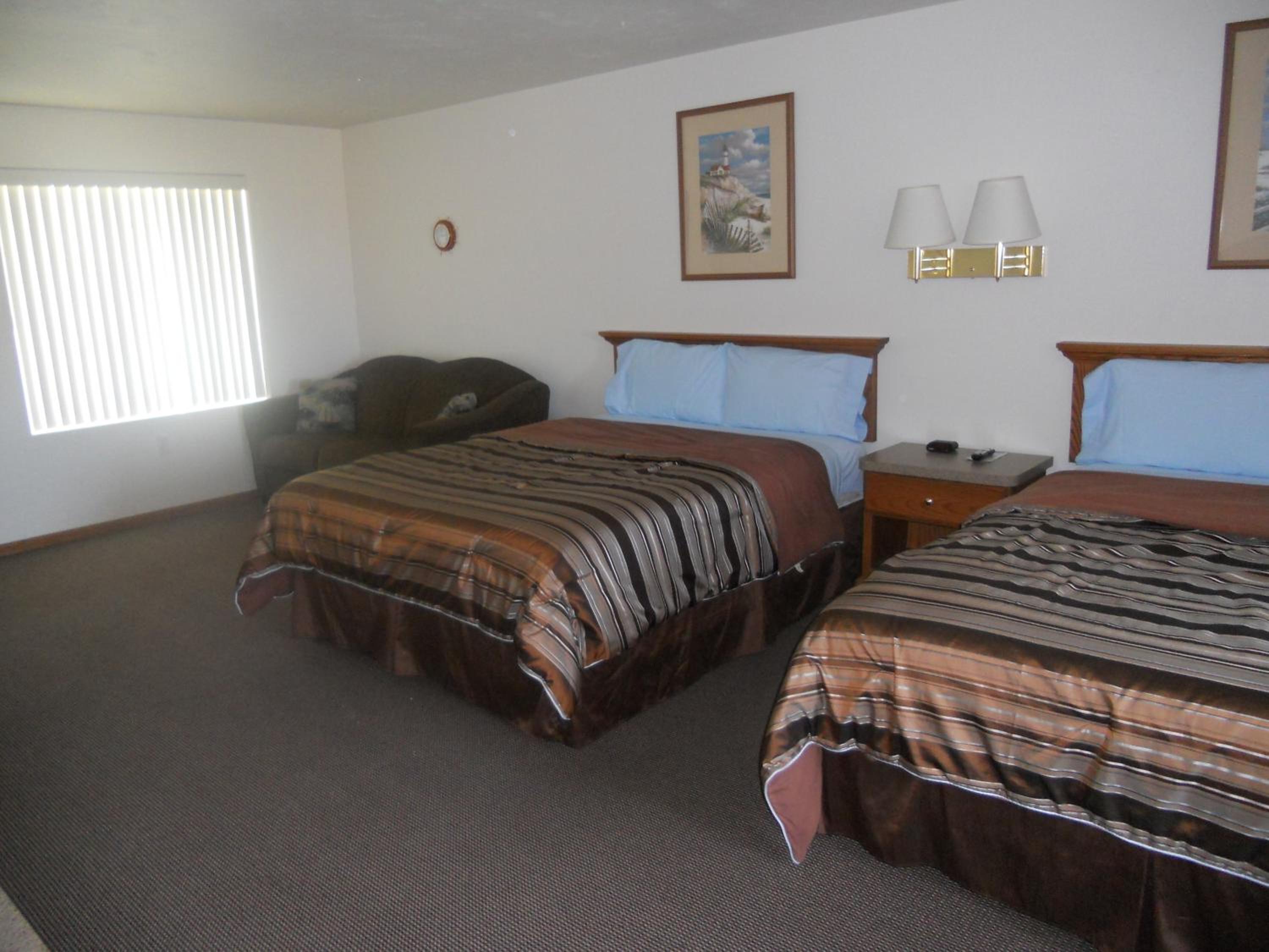 Queen Suite with Two Queen Beds and Sofa Bed photo 1