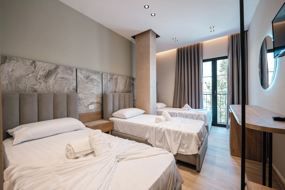 Triple Room with 3 single beds