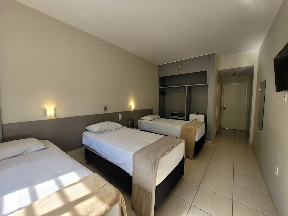 Quarto Triplo Luxo Twin photo 1