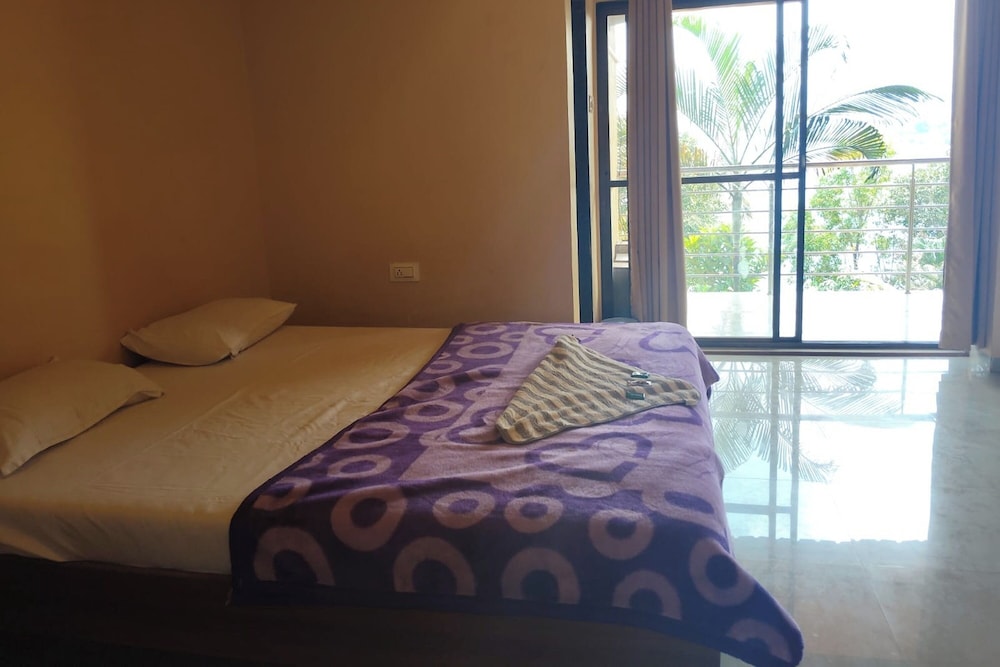 Grand Quadruple Room, 2 Queen Beds, Balcony, Ocean View