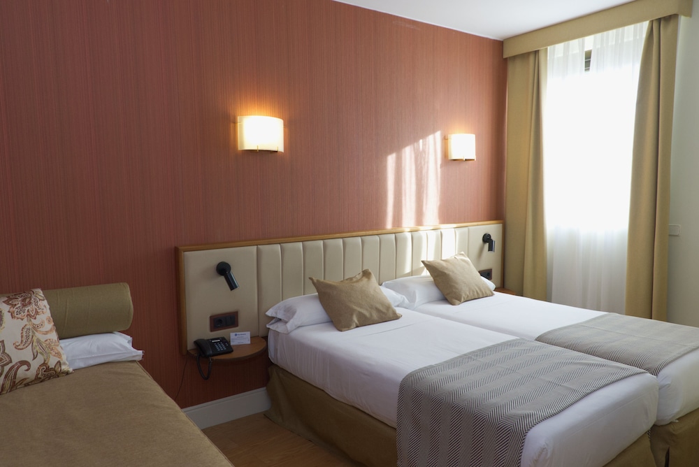 Triple Room - Photo 1
