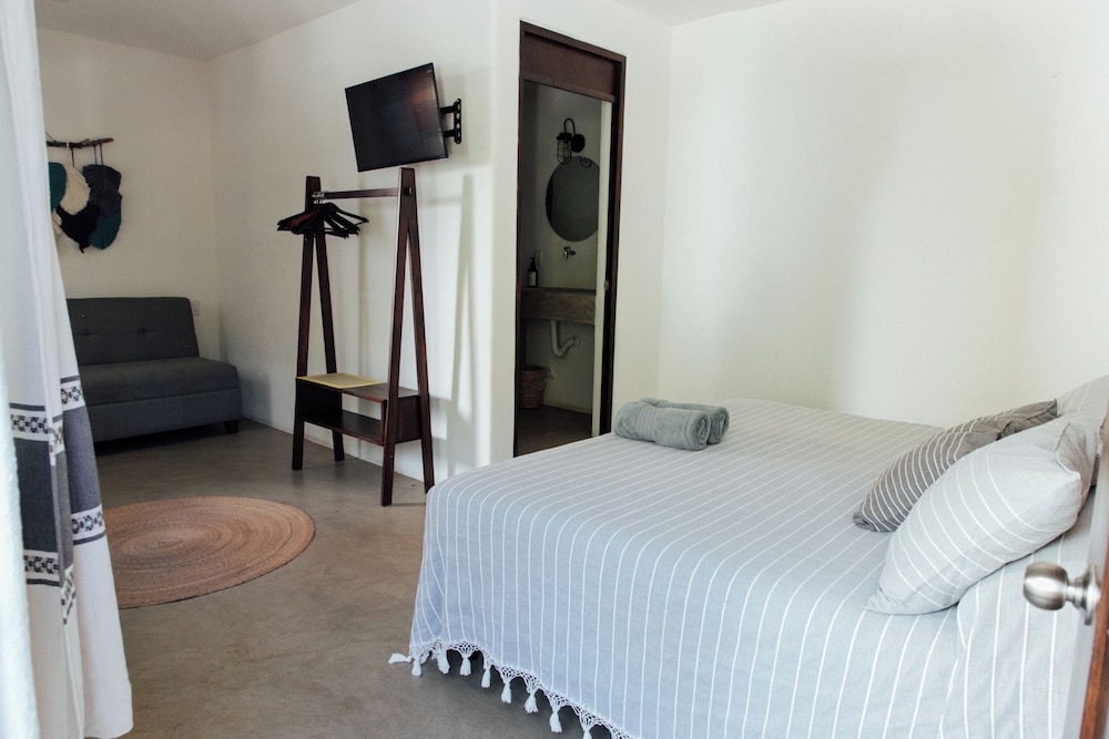 Deluxe Triple Room, Patio, Garden View