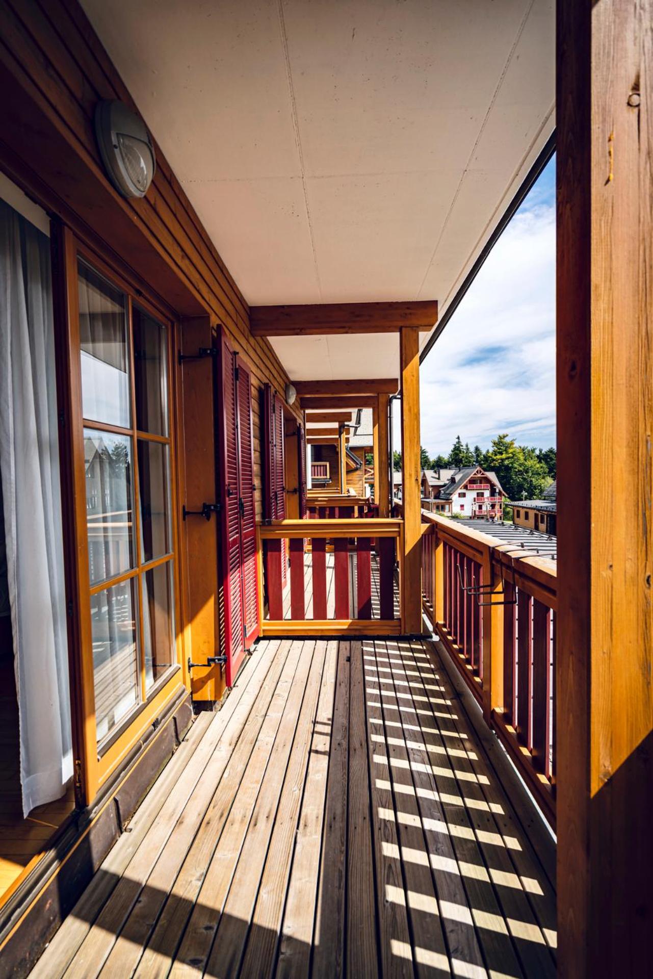Family Deluxe Room with Balcony - Photo 2