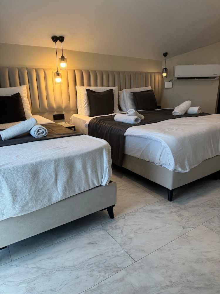 Deluxe Triple Room - Photo 8
