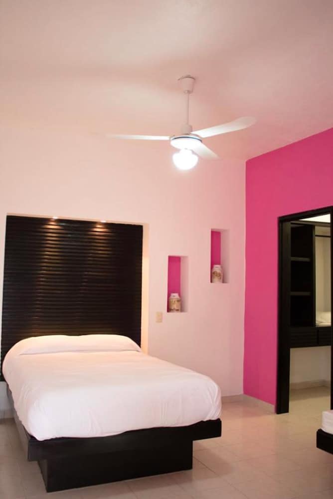 Deluxe Room, Multiple Beds, Pool View, Garden Area