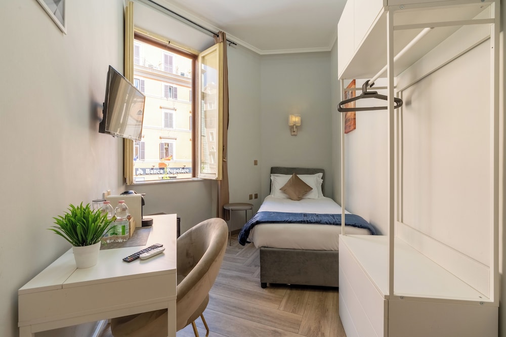 Camera Singola con bagno privato esterno
