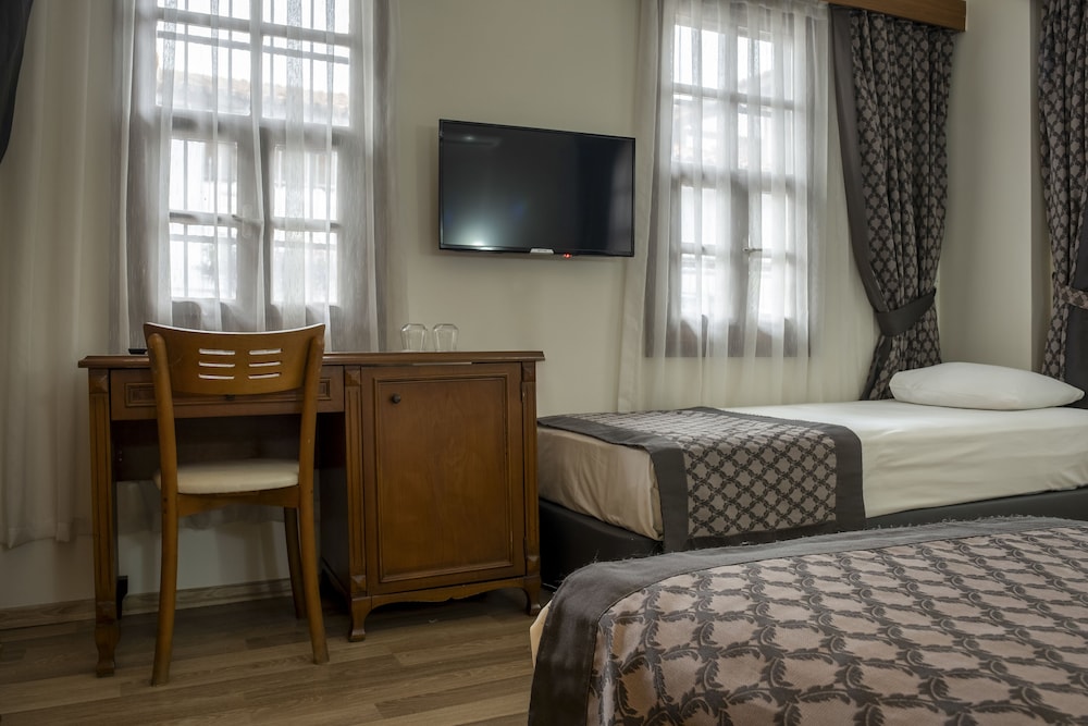 Standard Triple Room, Multiple Beds, Non Smoking, Garden View photo 3