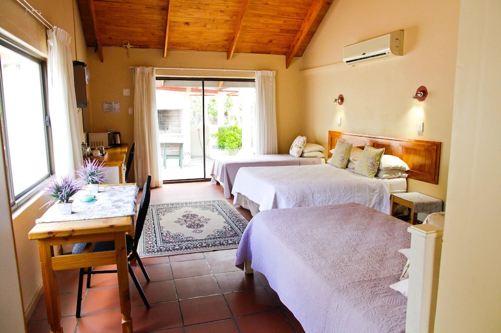 Family Quadruple Room, Multiple Beds, Garden View photo 1