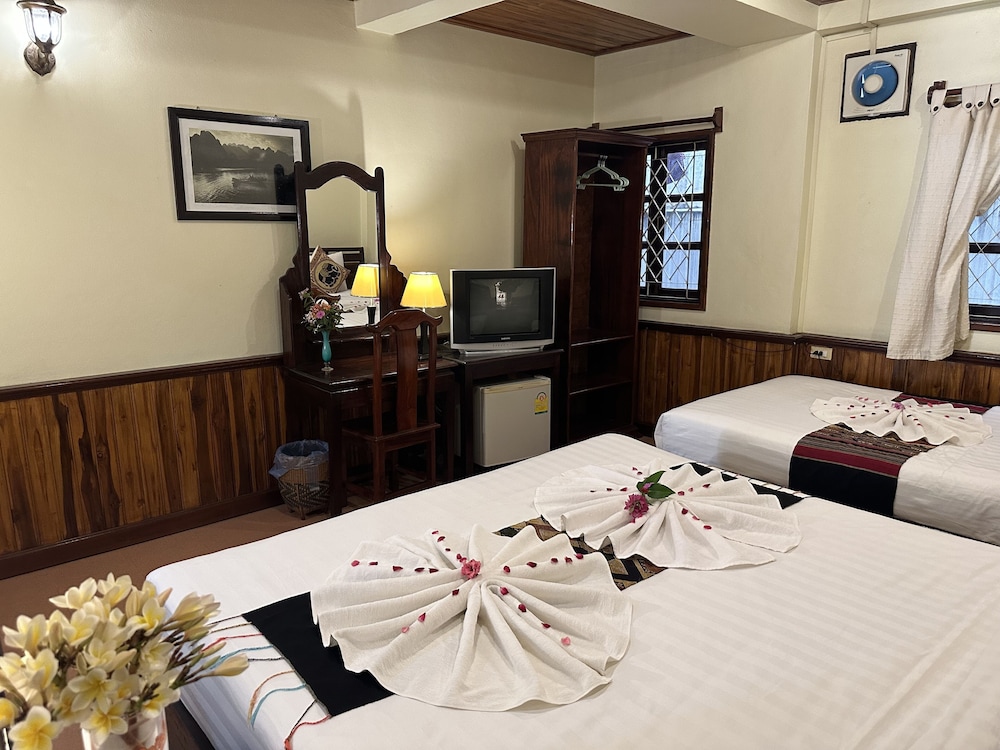 Deluxe Triple Room - Photo 21