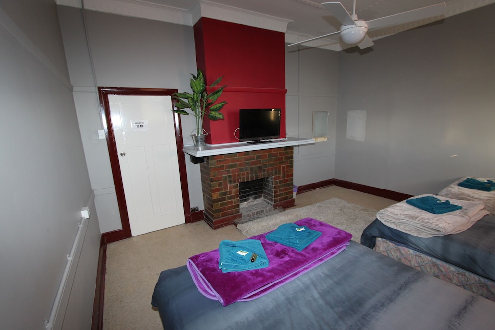 Deluxe Quadruple Room, Multiple Beds, Shared Bathroom (Room 7) photo 2