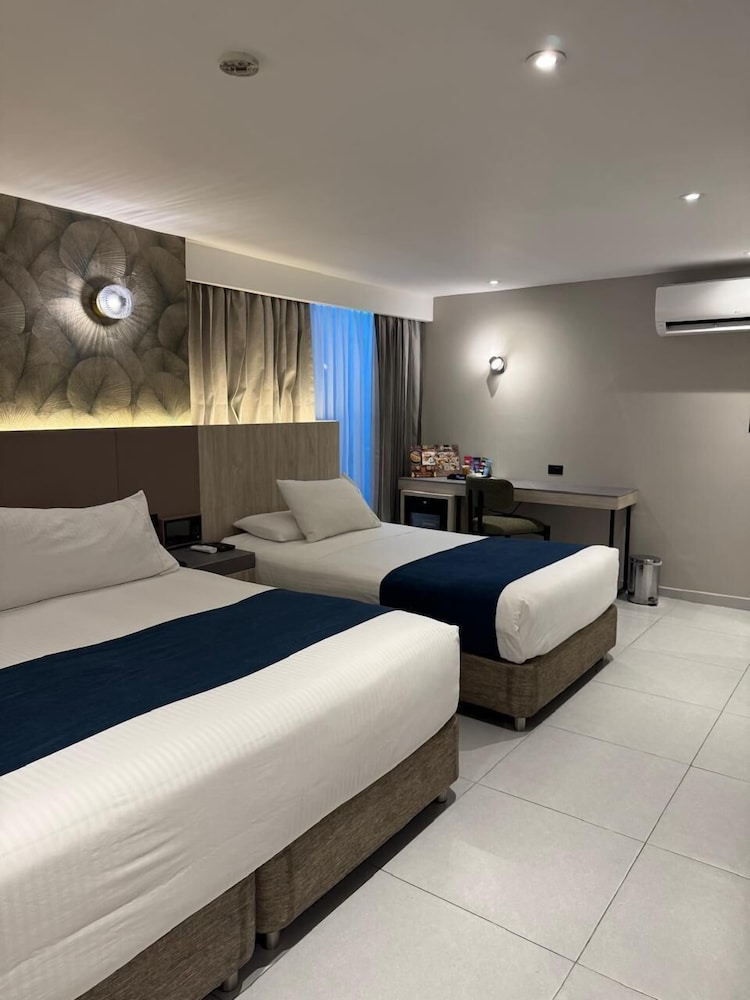 Standard Twin Room - Photo 4