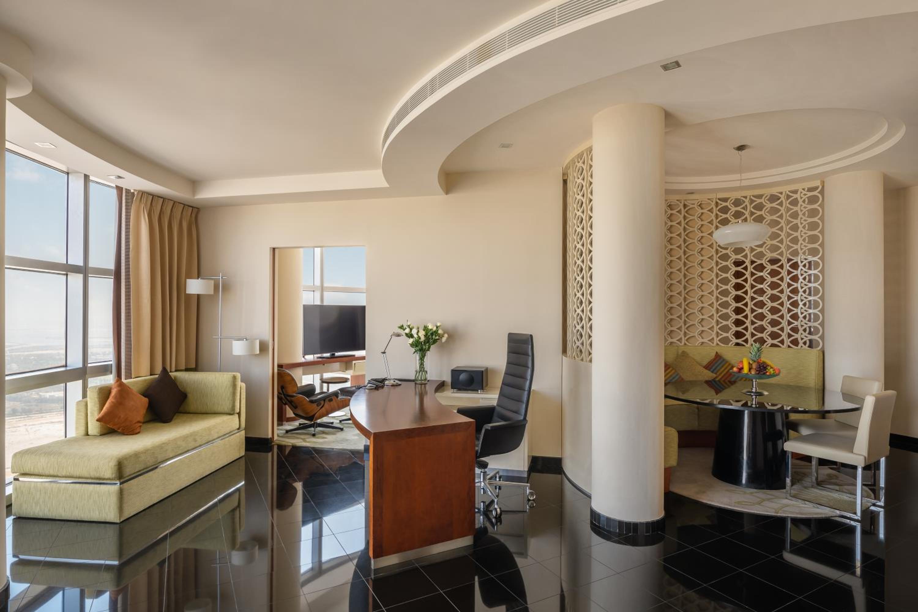 Executive Suite with Panoramic Skyline Views, Airport Transfers, Direct Connectivity to Museum of The Future, Complimentary Breakfast, Signature Afternoon Tea, Evening Sundowners, Soft Refreshments and Canapes