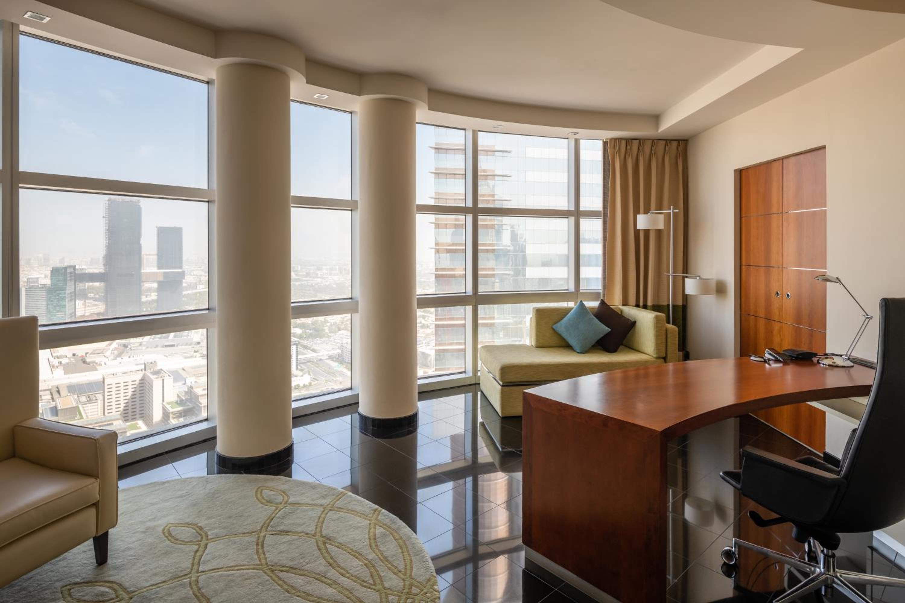 Executive Suite with Panoramic Skyline Views, Airport Transfers, Direct Connectivity to Museum of The Future, Complimentary Breakfast, Signature Afternoon Tea, Evening Sundowners, Soft Refreshments and Canapes