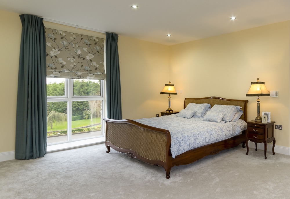 Deluxe Suite, Balcony, Garden View