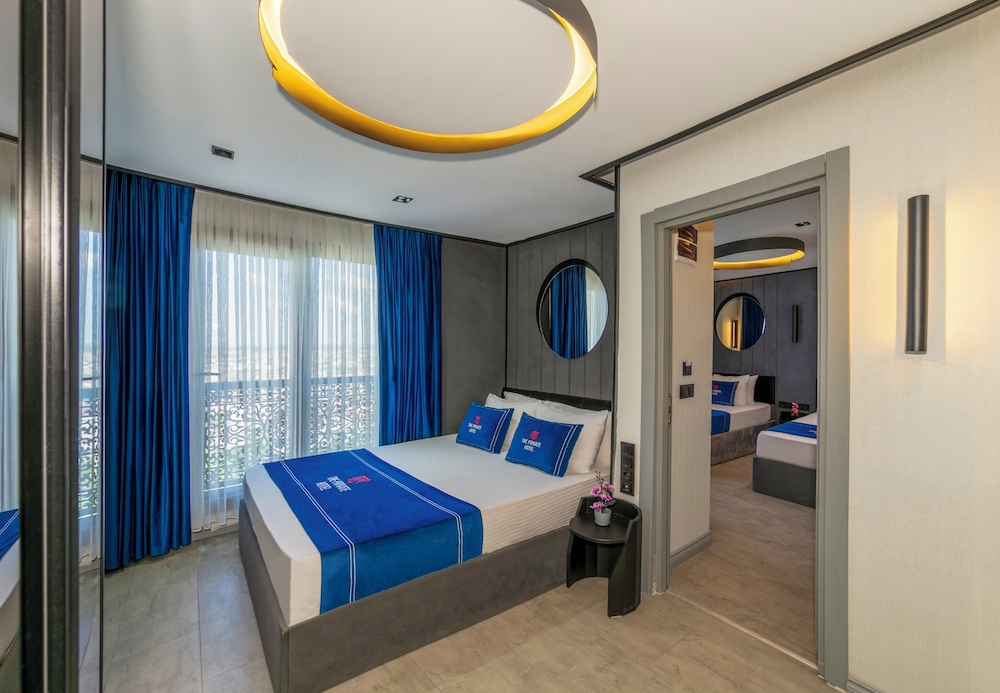 Deluxe Quadruple Room - Photo 1