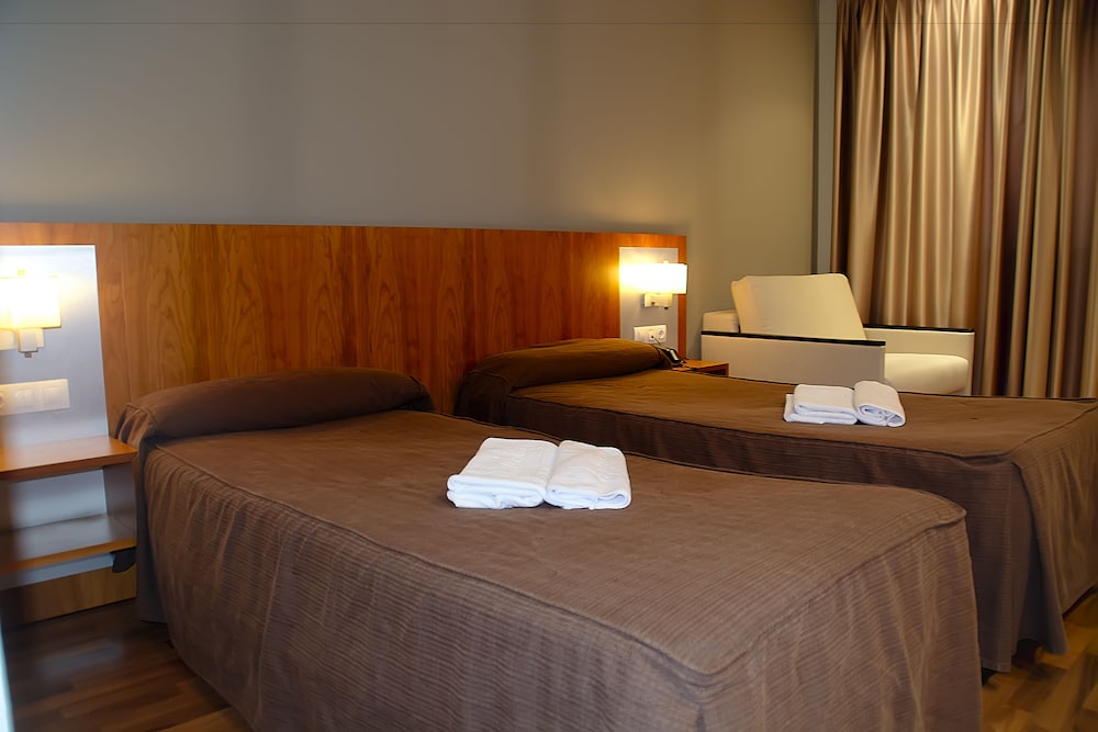 Triple Room (2 adultos + 1 niño) - Photo 1