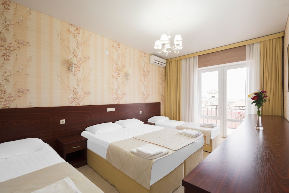 Deluxe Quadruple Room, Balcony