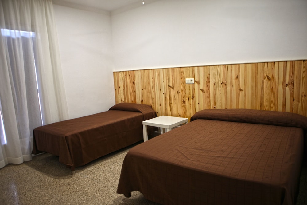 Habitación Cuádruple (2 Adultos + 2 Niños)