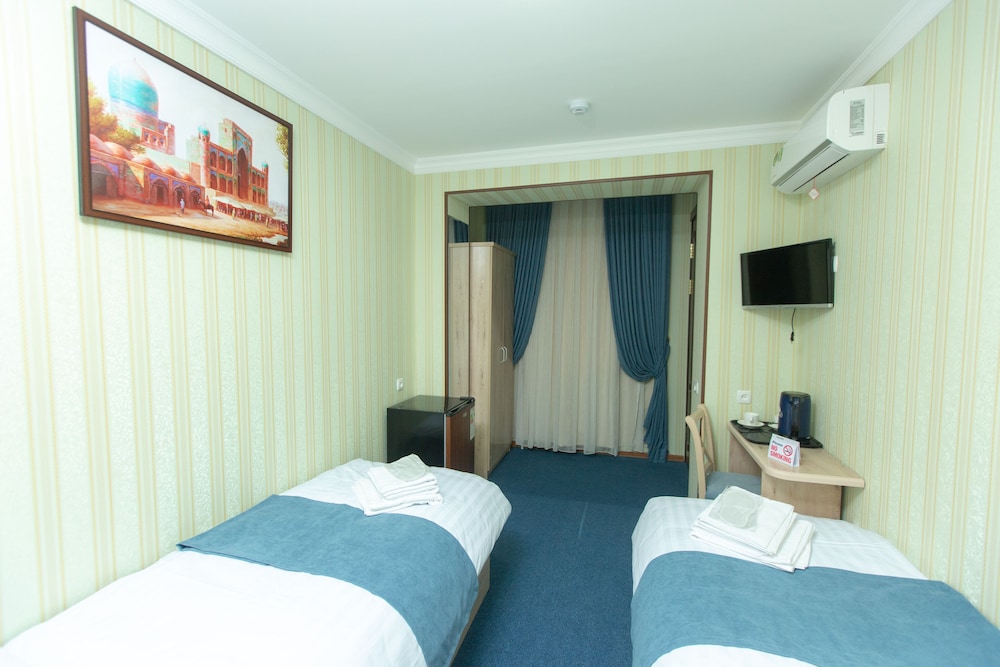 Standard Twin Room - Photo 8