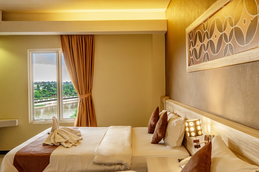 Deluxe Room - Photo 10