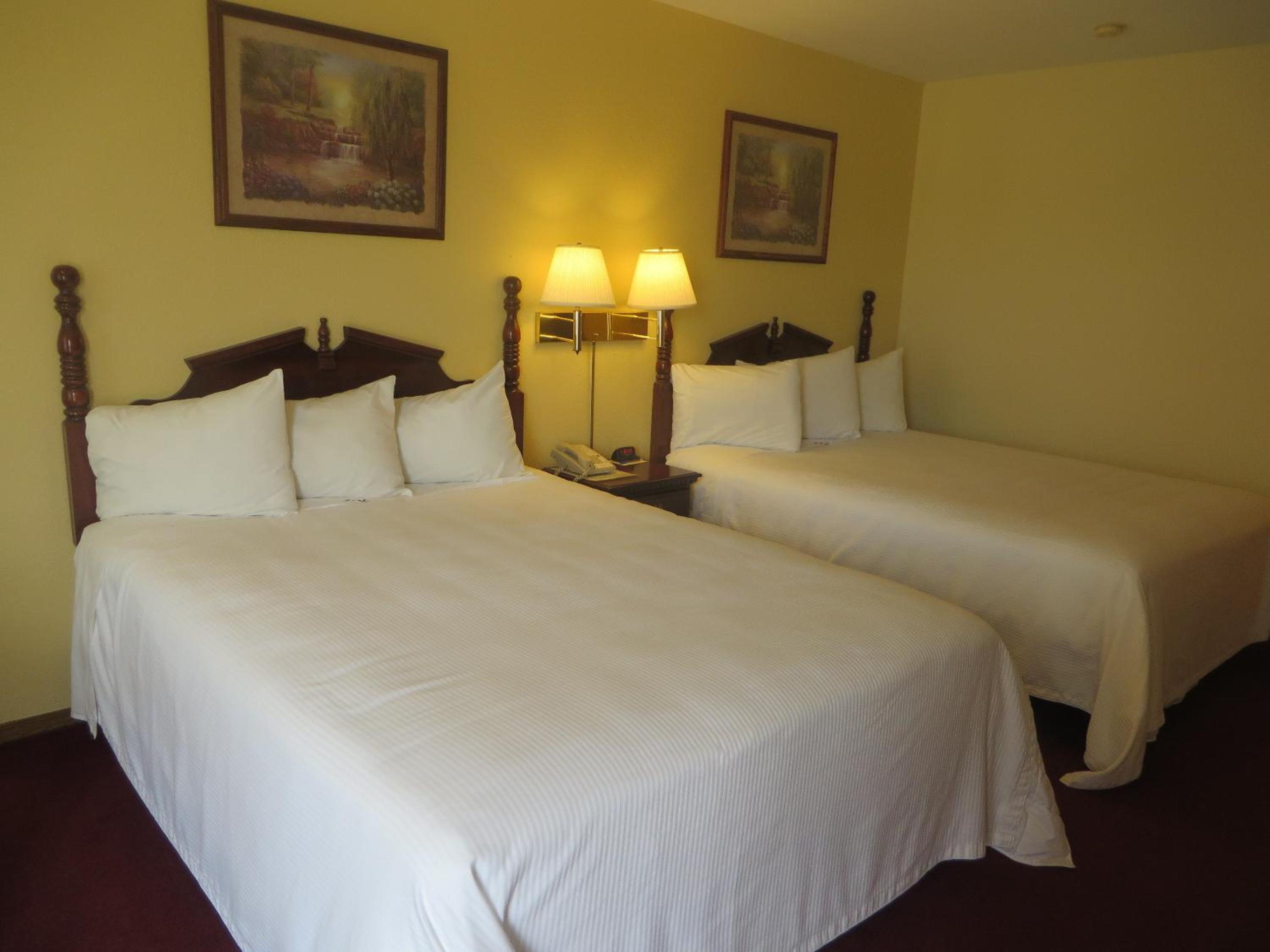 Queen Room with Two Queen Beds - Photo 1