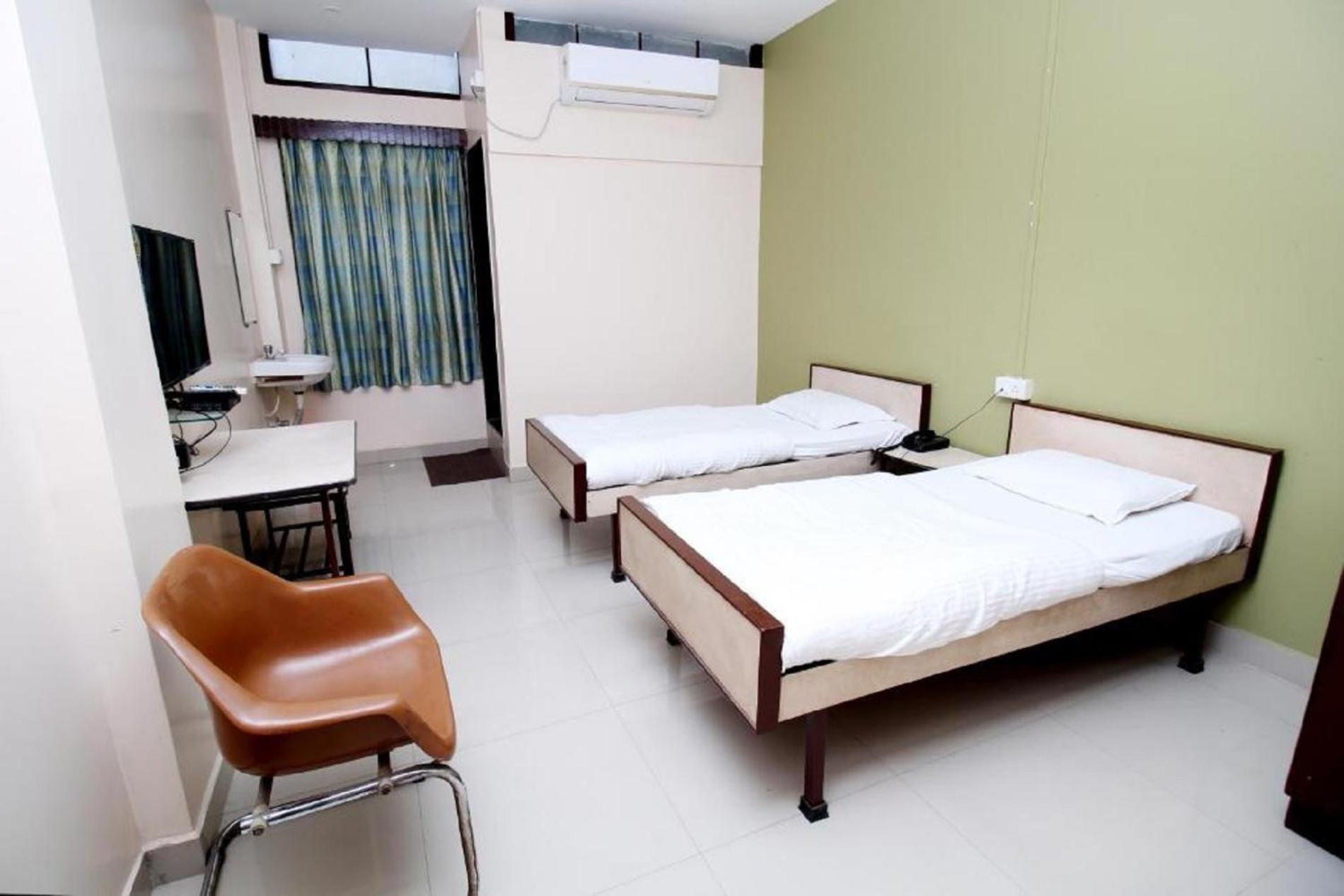 Executive Twin Room - AC photo 1