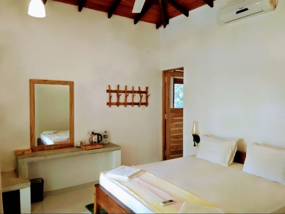 Deluxe Quadruple Room, Multiple Beds, Garden View photo 3
