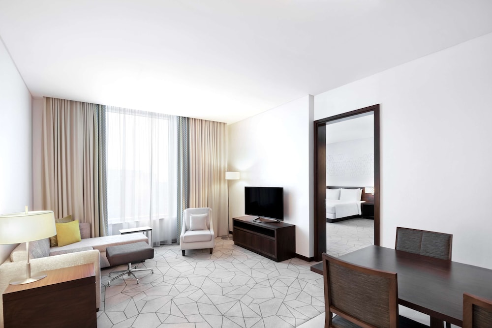 Suite, 1 King Bed with Sofa bed photo 1