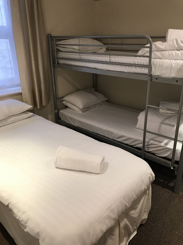 Quadruple Room, Beach View photo 1