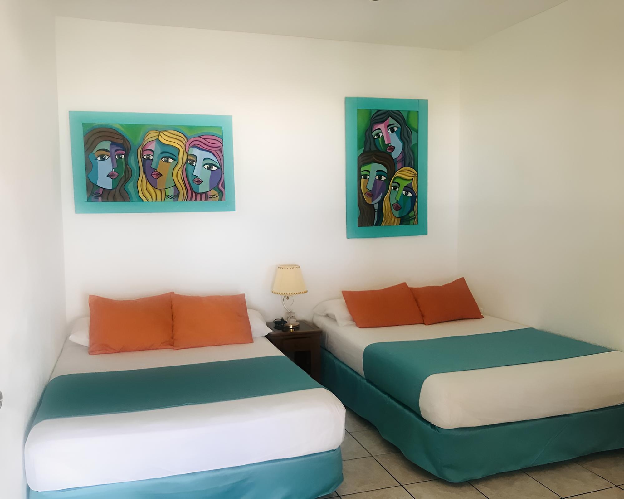 Superior Quadruple Room, 2 Double Beds, Terrace, Sea Facing photo 1