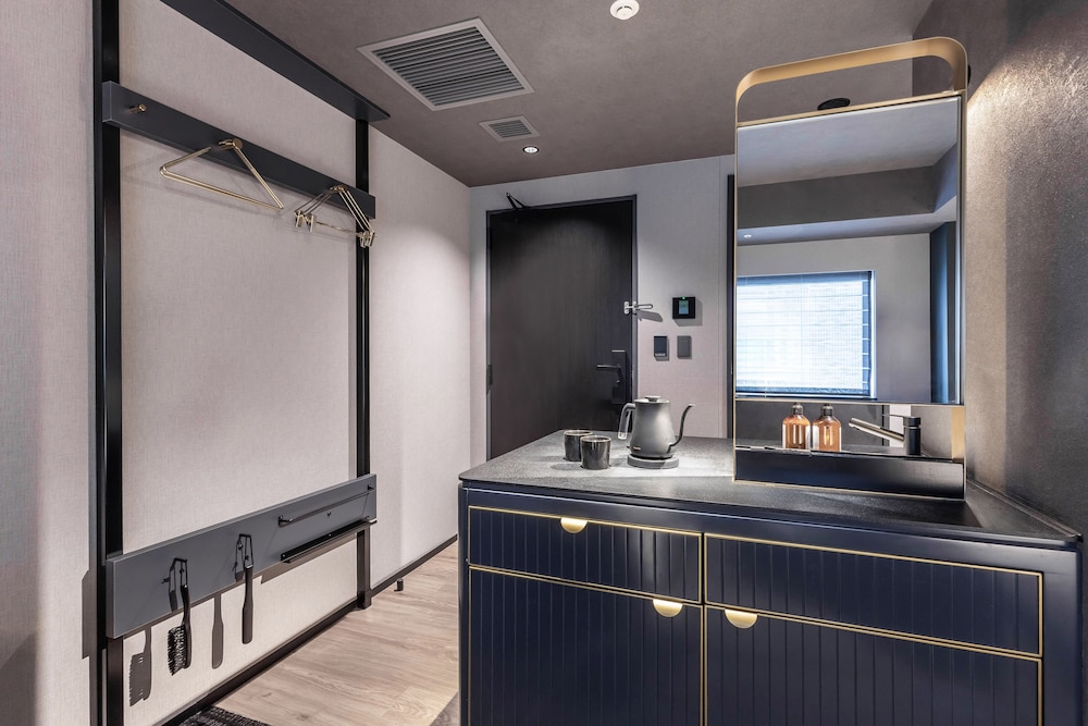 Deluxe Twin Room (with Washing Machine) - Photo 7