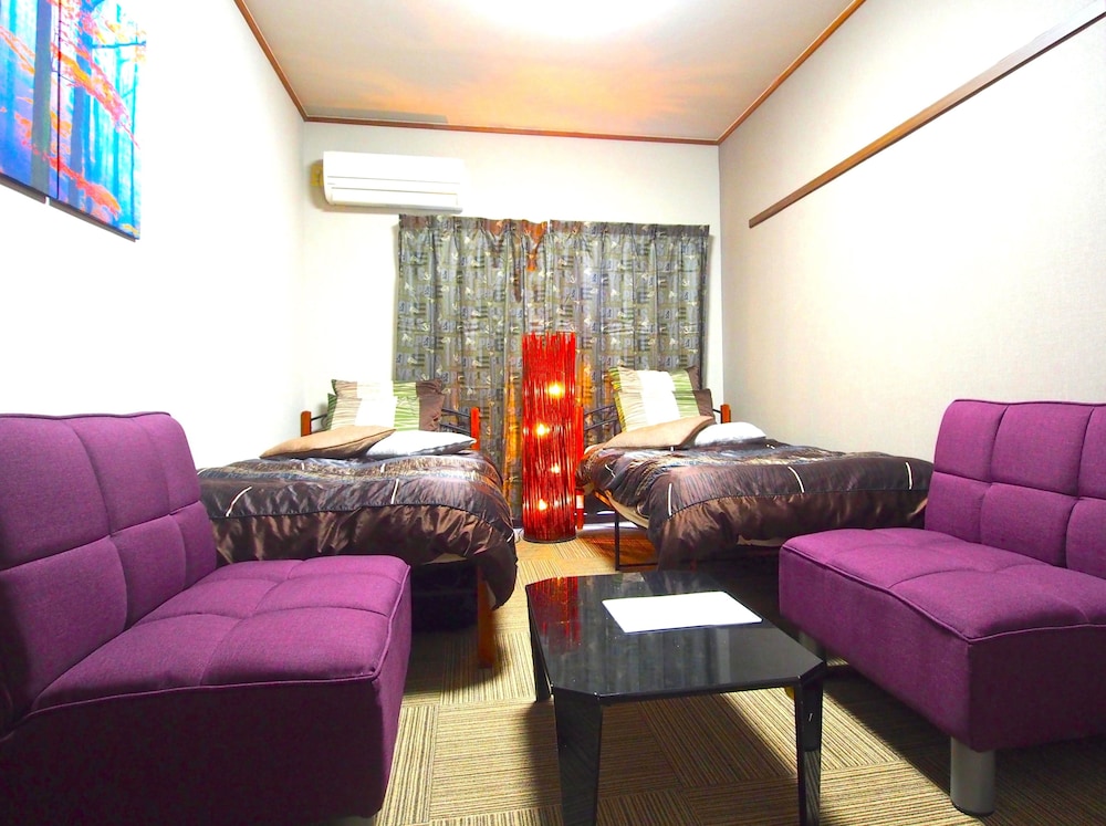 Western Style Room (2 single beds and a sofa bed) D