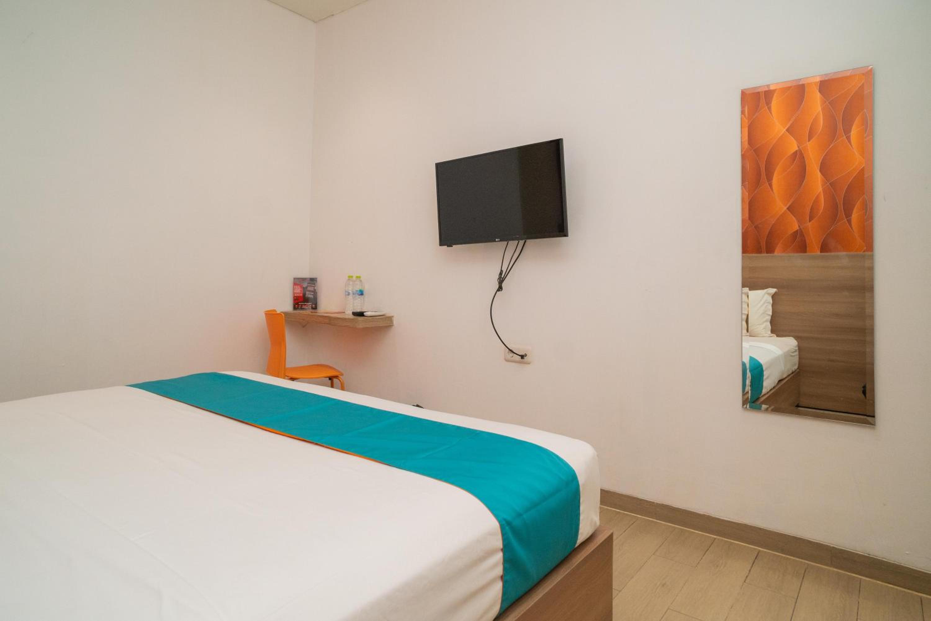 Deluxe Room - Photo 10
