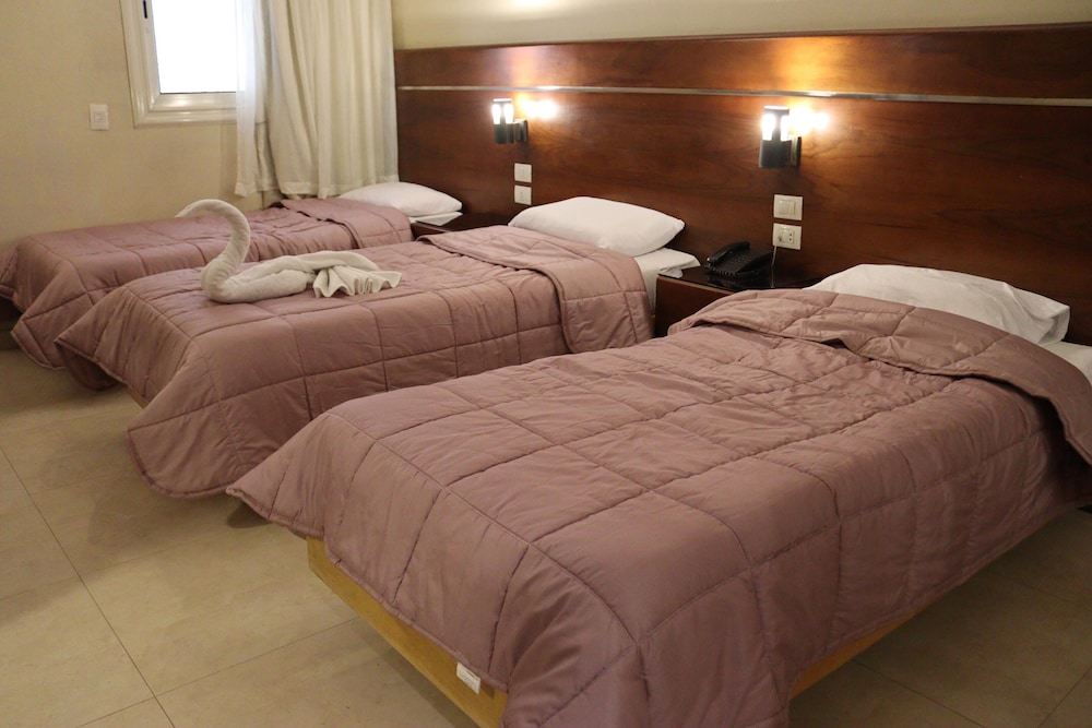 Deluxe Triple Room, City View photo 1