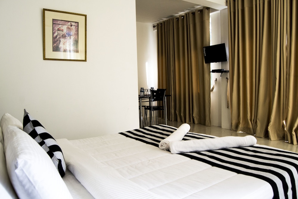 Deluxe Triple Room, 4 Bedrooms, Non Smoking, Garden View photo 1