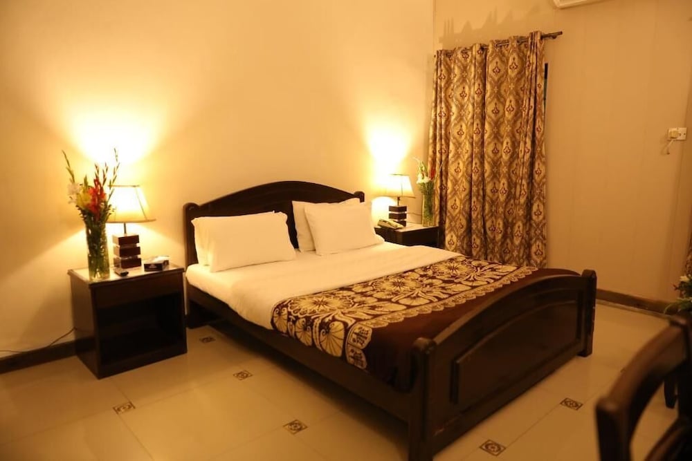 Deluxe Room - Photo 1