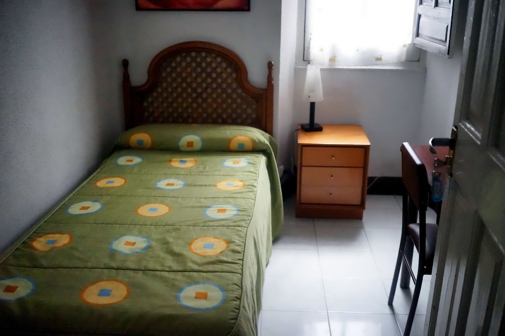 Habitación individual, baño compartido