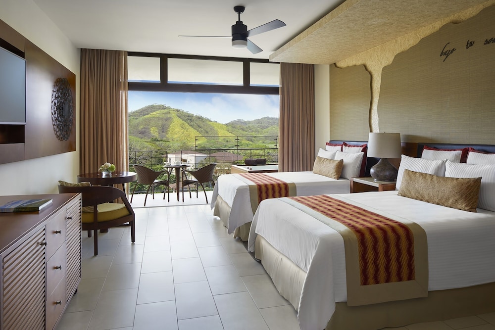 Suite Junior Cama Doble Vista Tropical